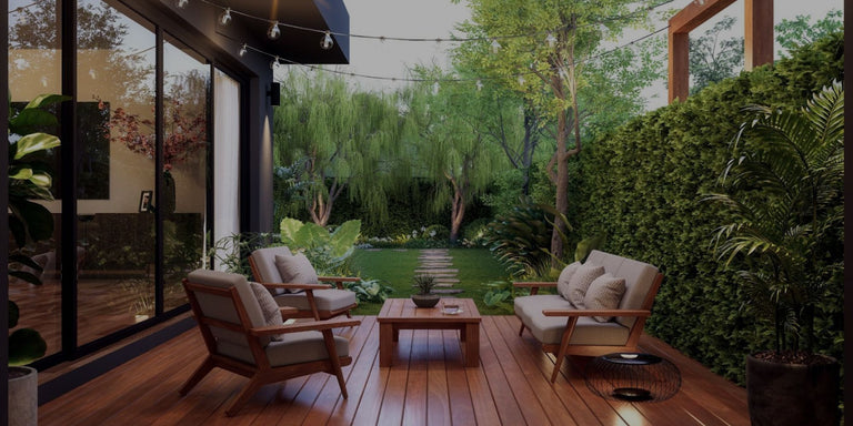 Outdoor patio area with wooden furniture and a garden view